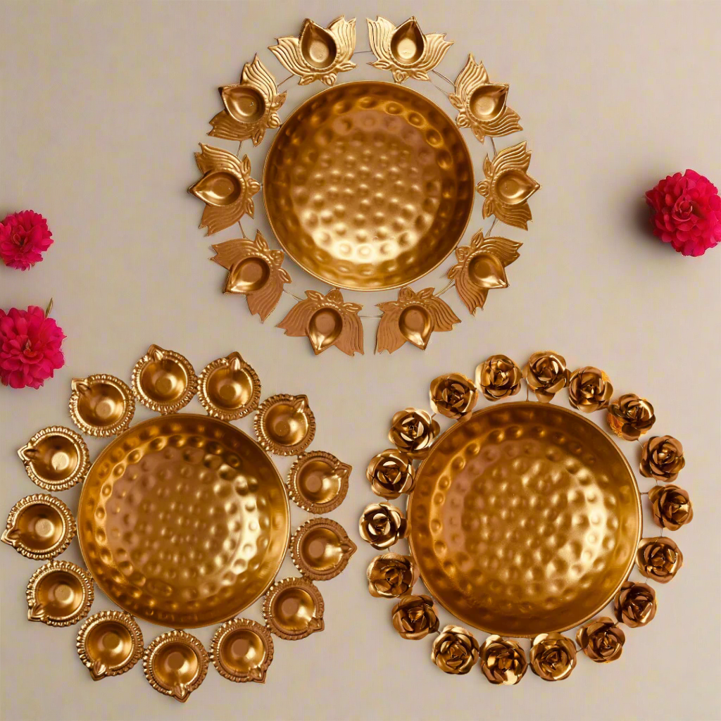 Elegant Urli Set of 3 — Rose, Lotus and Diya designs | Golden metal floating flower bowls for Diwali decoration, pooja décor and festive centerpiece by Oracryst
